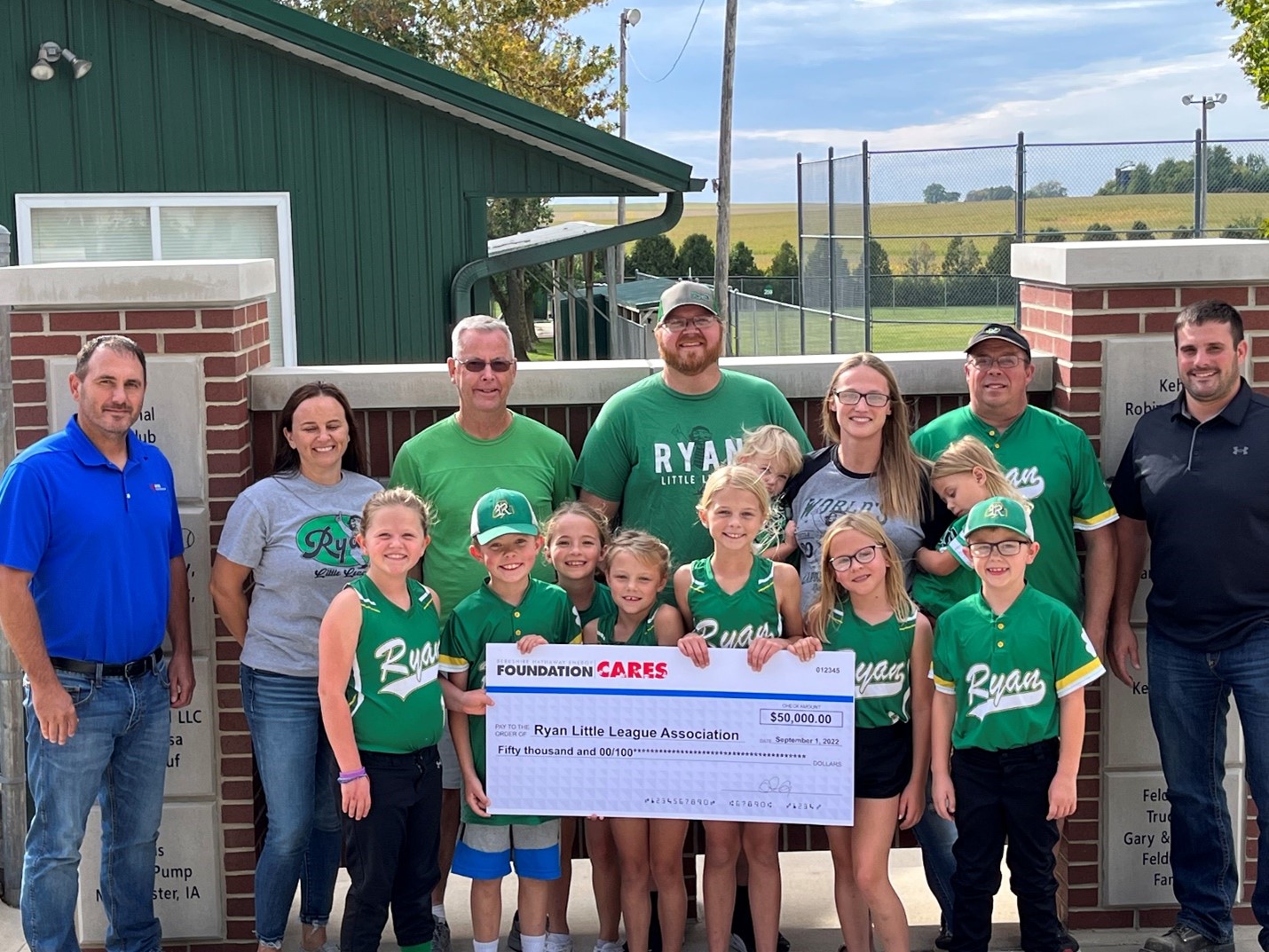 Members of the Ryan Little League Accept Foundation Donation
